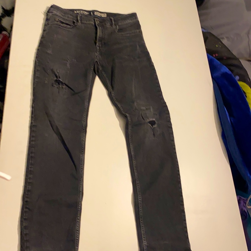 Faded black straight legged jeans